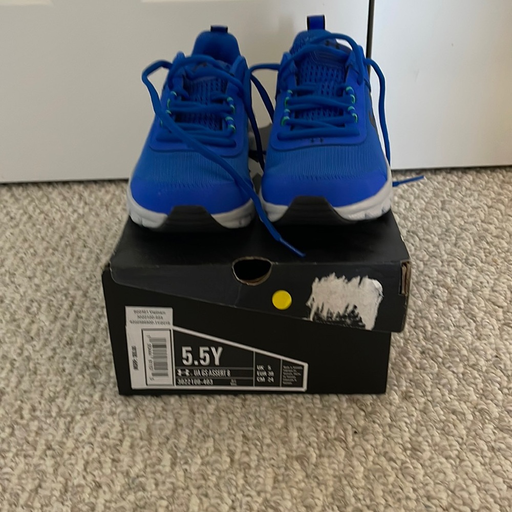 Boys Under Armour  size 5.5. Brand new. Never worn